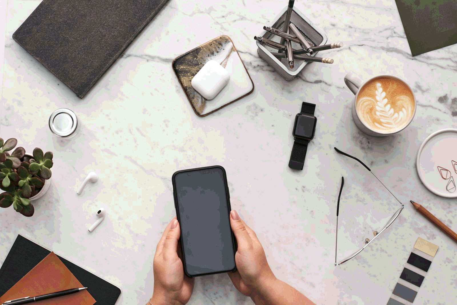 Smartphone on a creative desk ready for social content planning