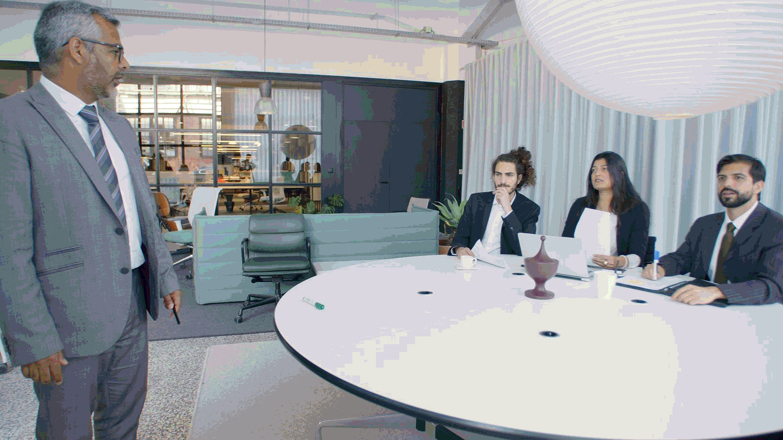 Professional business meeting in a modern conference room for sales enablement