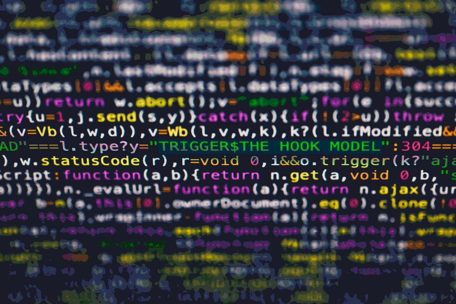 Code editor and laptop representing Claude and ChatGPT coding comparison